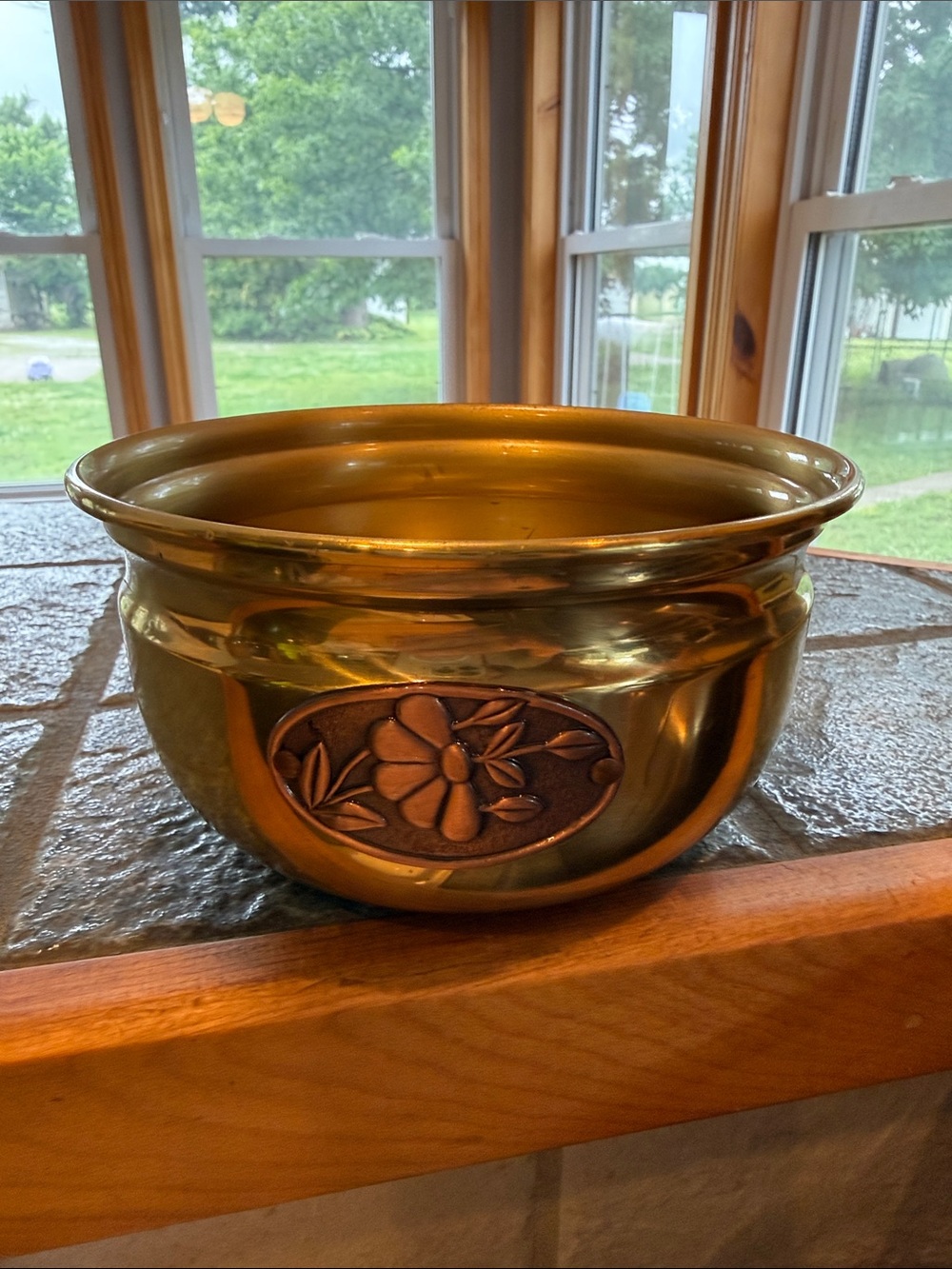 vintage Princess House brass planter bowl featuring a copper floral emblem